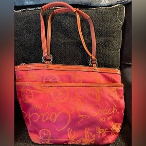 Coach in peach and pink